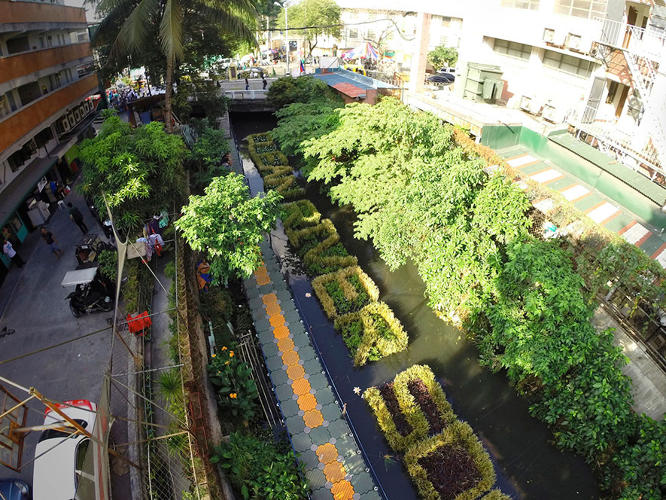 3031514-slide-s-3-this-floating-billboard-is-cleaning-up-a-polluted-river-in-manila